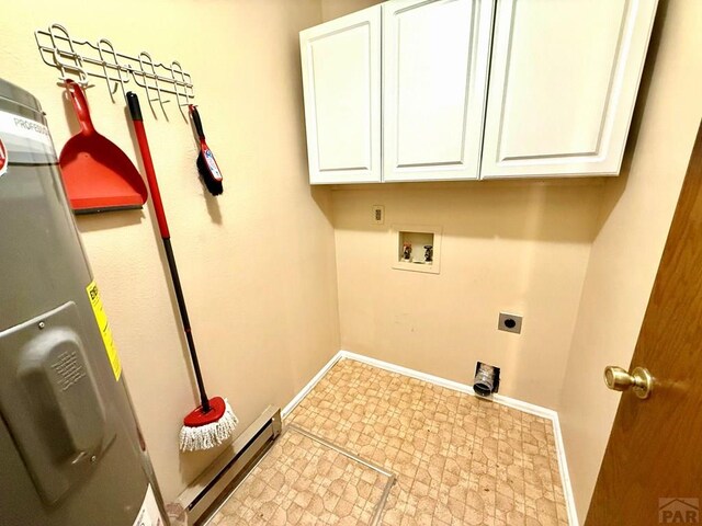 2302 Cartier Dr Unit A, Pueblo, CO 81005 - washroom with baseboard heating, cabinet space, washer hookup, electric dryer hookup, and tile patterned floors