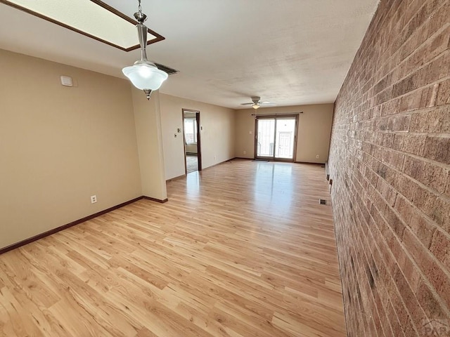 2302 Cartier Dr Unit A, Pueblo, CO 81005 - spare room with light wood-style flooring and ceiling fan