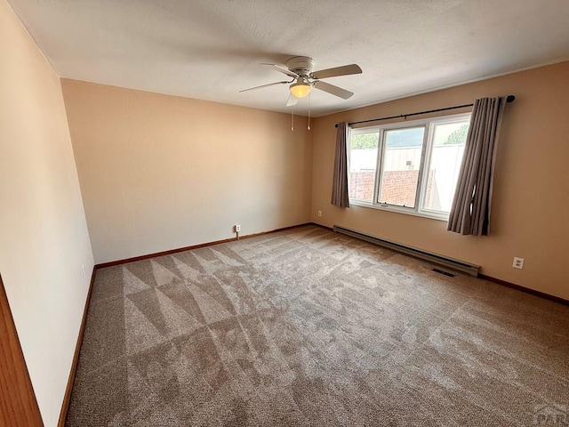 2302 Cartier Dr Unit A, Pueblo, CO 81005 - carpeted empty room featuring a baseboard radiator and ceiling fan