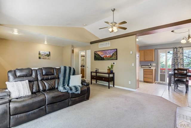 living room featuring ceiling fan, light carpet, baseboards, vaulted ceiling, and visible vents