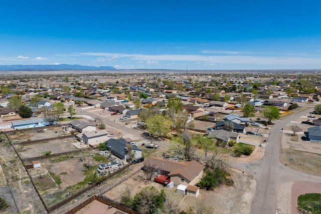 aerial view featuring a residential view and a mountain view