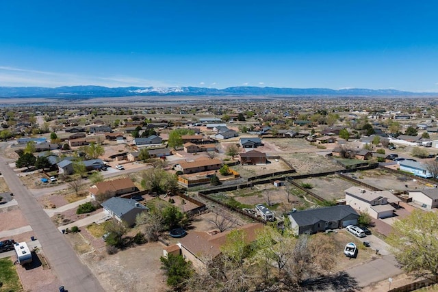 bird's eye view featuring a residential view and a mountain view