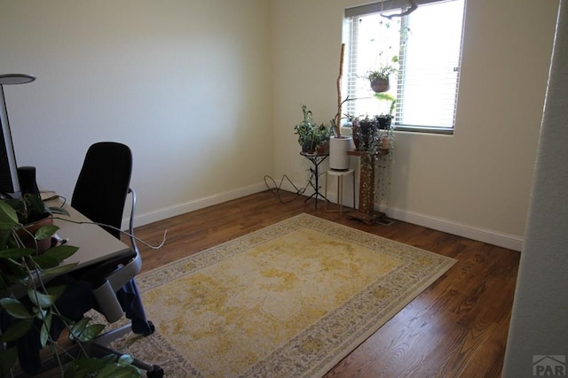 1470 Villa Spanada, Pueblo, CO 81006 - home office with wood finished floors and baseboards