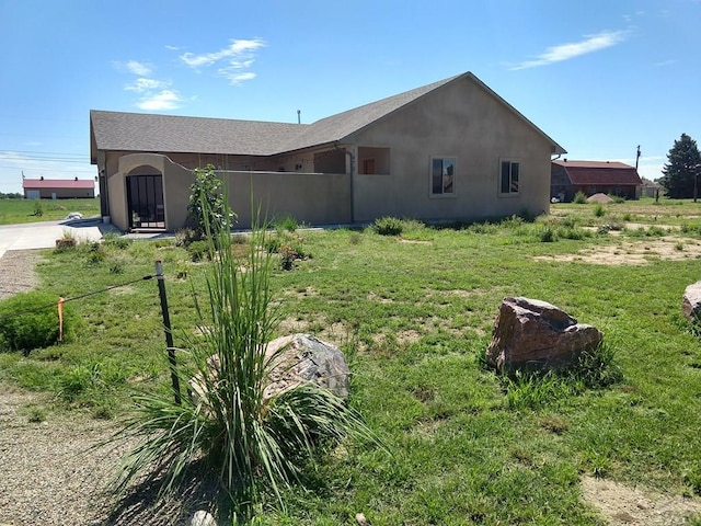 1470 Villa Spanada, Pueblo, CO 81006 - view of side of home featuring stucco siding