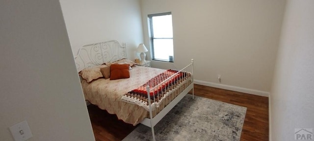 1470 Villa Spanada, Pueblo, CO 81006 - bedroom with wood finished floors and baseboards
