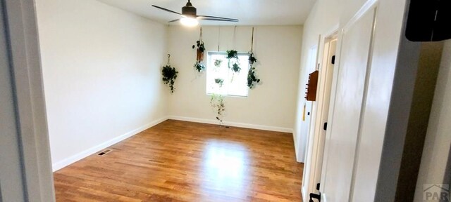 1470 Villa Spanada, Pueblo, CO 81006 - unfurnished room with light wood finished floors, ceiling fan, and baseboards