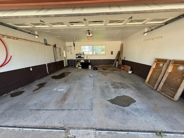 480 W 9th Ave, Lamar, CO 81073 - garage featuring a garage door opener