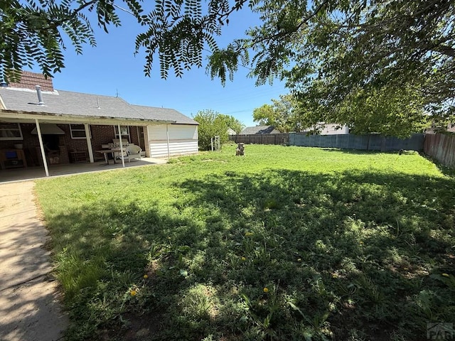480 W 9th Ave, Lamar, CO 81073 - view of yard with a patio area
