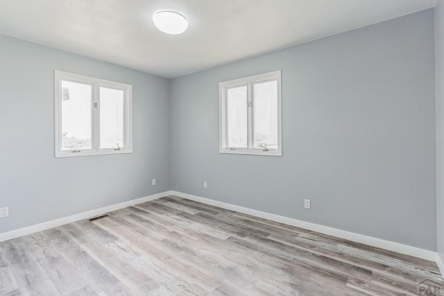 862 S Los Mochis Way, Pueblo, CO 81007 - empty room with wood finished floors