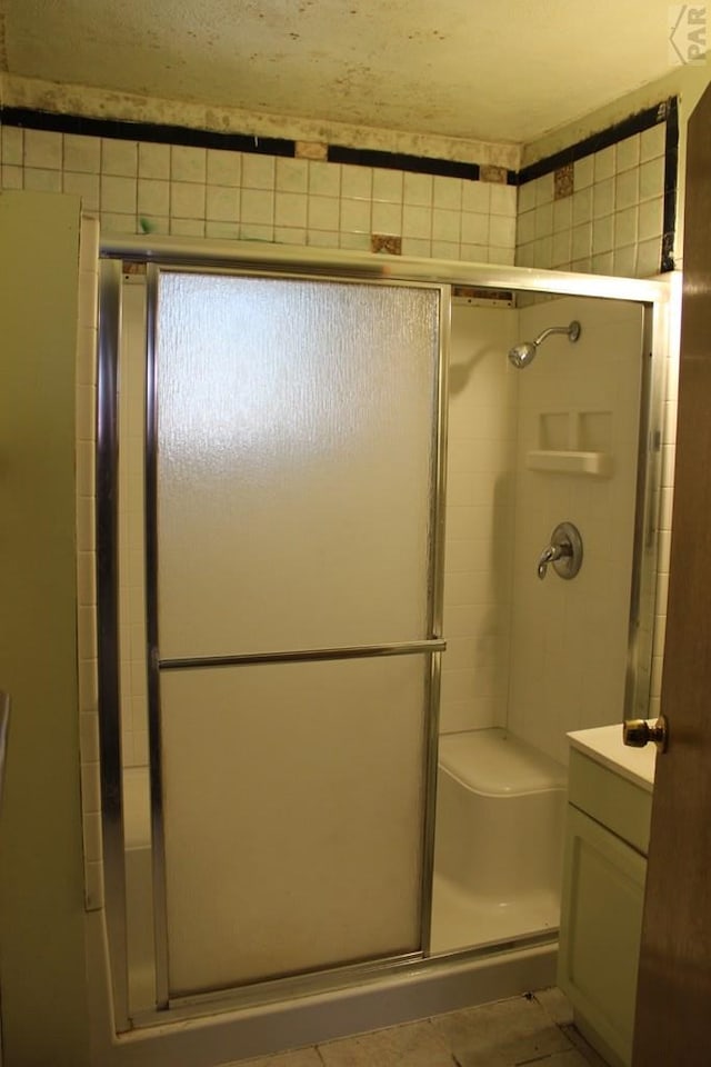 full bath with a stall shower