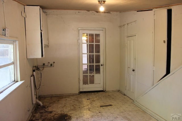 doorway to outside featuring light floors