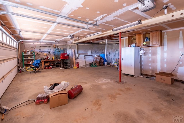 garage featuring a garage door opener