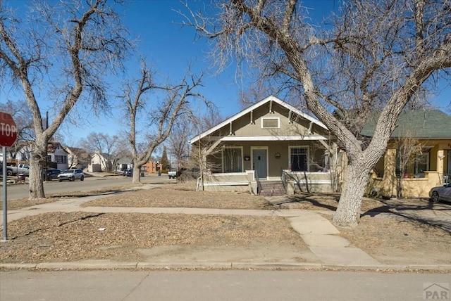 bungalow-style house with covered porch