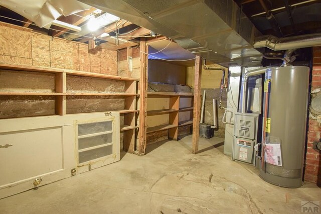 unfinished basement with water heater