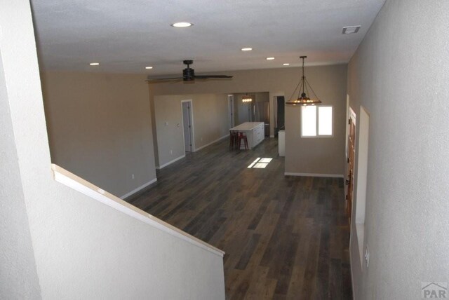 unfurnished dining area featuring carpet, baseboards, and recessed lighting