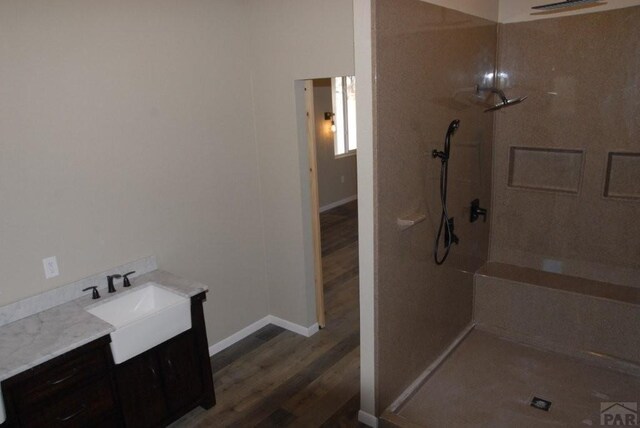 empty room featuring a ceiling fan, recessed lighting, light carpet, and baseboards