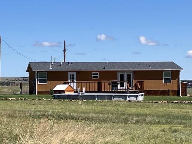 8417 3r Rd, Beulah, CO 80123 - rear view of property featuring a wooden deck and french doors