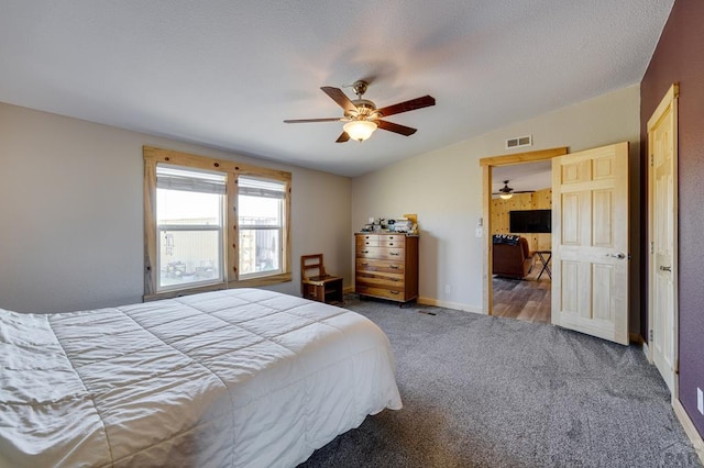 8417 3r Rd, Beulah, CO 80123 - carpeted bedroom with vaulted ceiling, ceiling fan, and baseboards