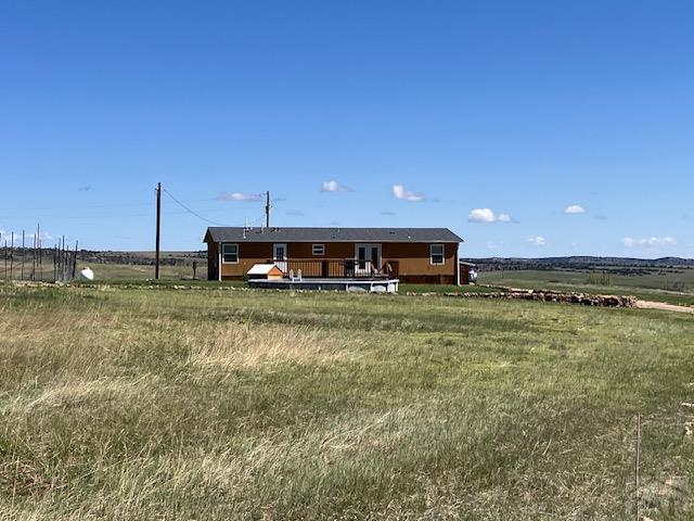 8417 3r Rd, Beulah, CO 80123 - view of yard with a deck and a view of countryside