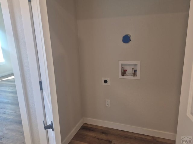 laundry area with laundry area, baseboards, wood finished floors, hookup for a washing machine, and hookup for an electric dryer