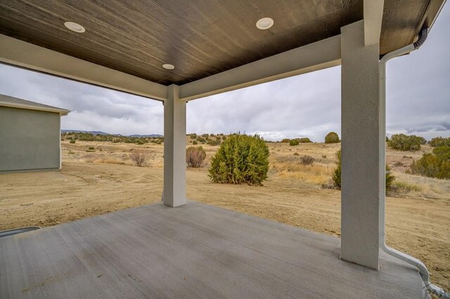 view of patio with a rural view