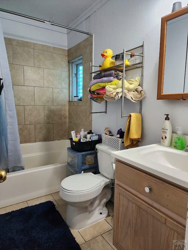 full bath featuring toilet, shower / tub combo, vanity, and tile patterned floors