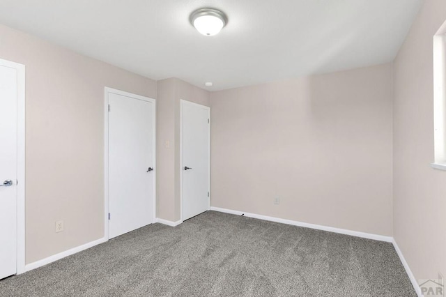 1510 24 1/4 Ln, Pueblo, CO 81006 - unfurnished bedroom with carpet flooring and baseboards