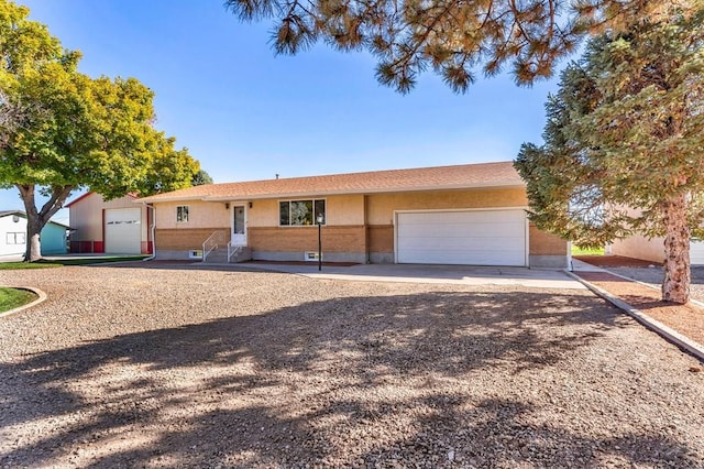 1510 24 1/4 Ln, Pueblo, CO 81006 - ranch-style house featuring an attached garage and driveway