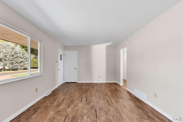 1510 24 1/4 Ln, Pueblo, CO 81006 - unfurnished room featuring wood finished floors and baseboards