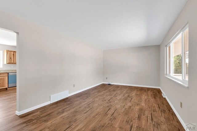 1510 24 1/4 Ln, Pueblo, CO 81006 - spare room with wood finished floors and baseboards