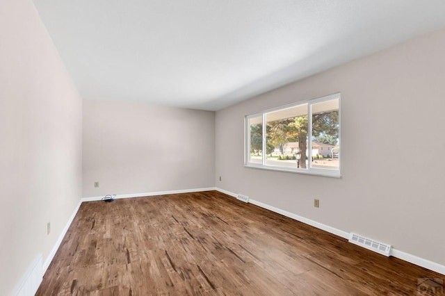 1510 24 1/4 Ln, Pueblo, CO 81006 - spare room featuring wood finished floors and baseboards