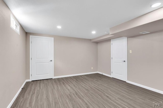 1510 24 1/4 Ln, Pueblo, CO 81006 - below grade area with wood finished floors, baseboards, and recessed lighting