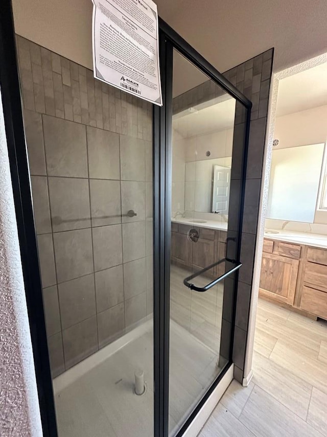 962 E Sandusky Dr, Pueblo West, CO 81007 - bathroom featuring a shower stall and vanity