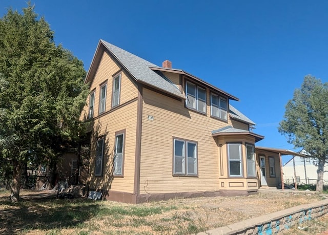 exterior space with a chimney