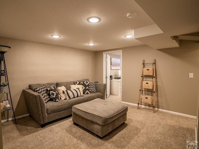 living room with a textured ceiling, carpet floors, recessed lighting, and baseboards