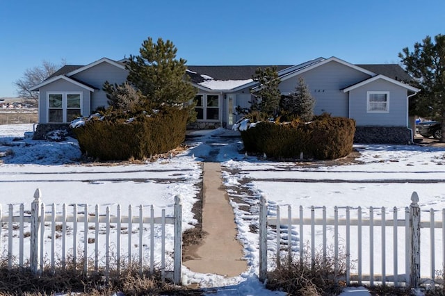 view of front of home with fence