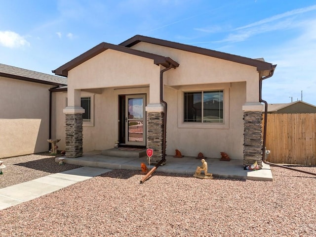 1700 Kingfisher Ln, Pueblo, CO 81008 - view of front of property with stone siding and stucco siding