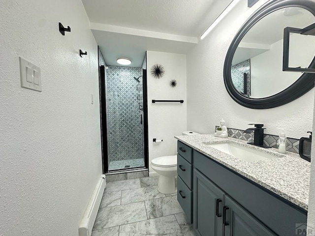 full bathroom with a stall shower, toilet, marble finish floor, baseboard heating, and vanity