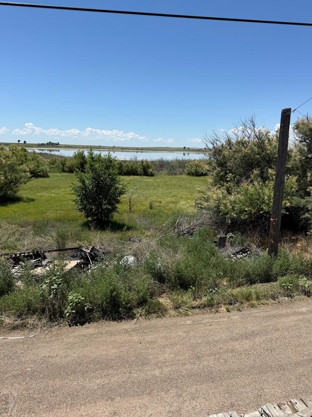 209 Beymer, Cheraw, CO 81030 - view of yard featuring a water view