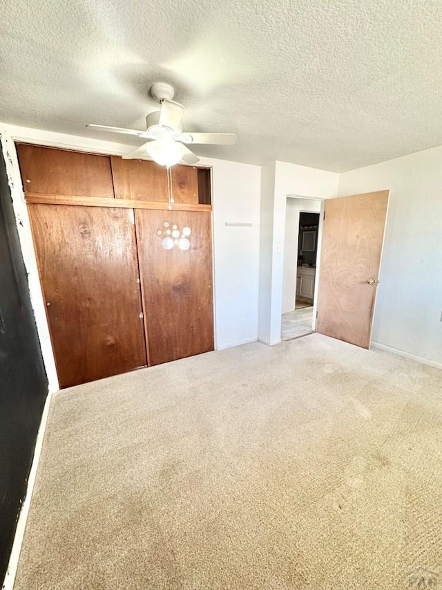 209 Beymer, Cheraw, CO 81030 - unfurnished bedroom with carpet, a textured ceiling, a closet, and ceiling fan