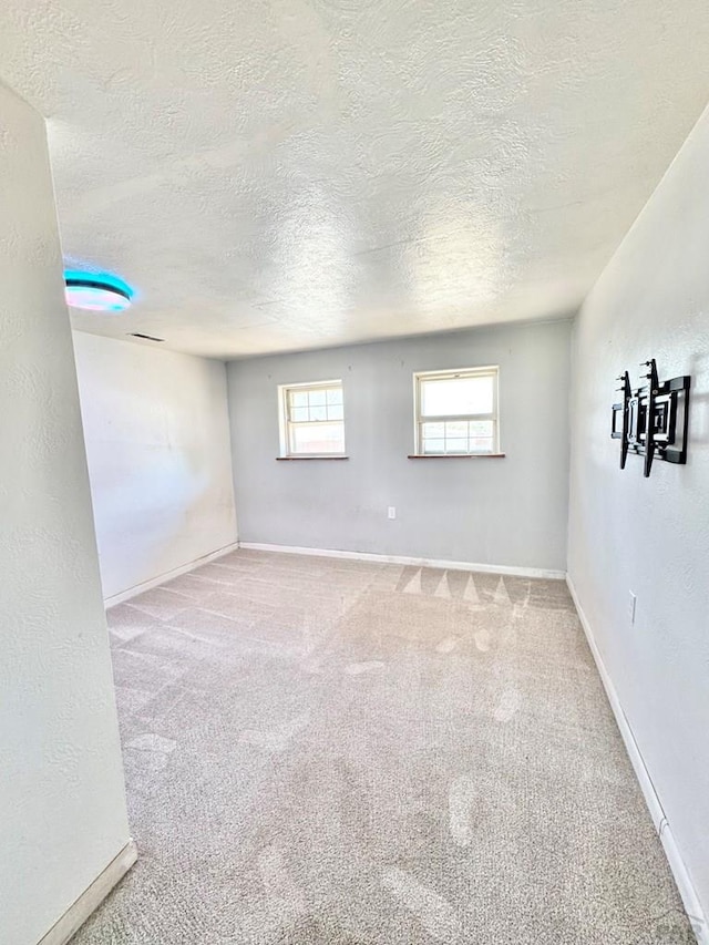 209 Beymer, Cheraw, CO 81030 - unfurnished room featuring a textured ceiling and carpet flooring