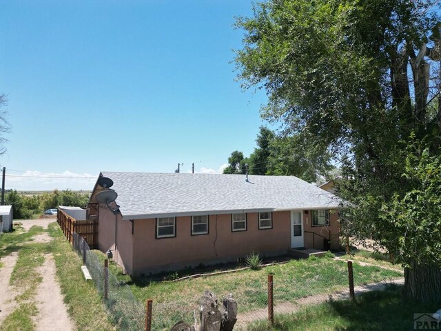 209 Beymer, Cheraw, CO 81030 - rear view of house with a shingled roof