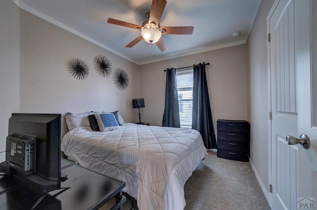 bedroom with ceiling fan, baseboards, crown molding, and light colored carpet