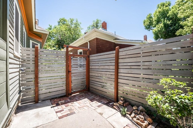 view of patio featuring fence