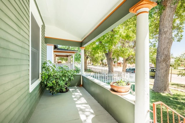 balcony featuring a porch