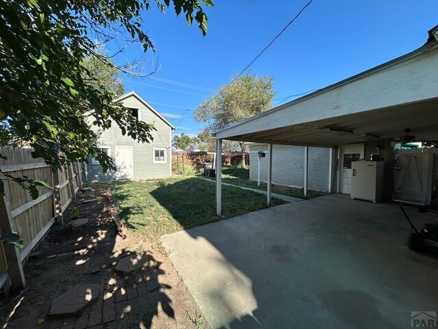 2707 4th Ave, Pueblo, CO 81003 - view of yard with an outbuilding and a patio area