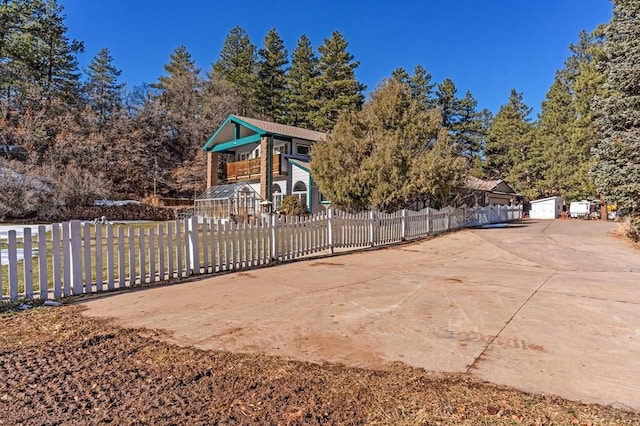 view of yard with a garage and fence