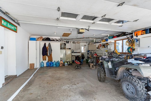 garage featuring a garage door opener