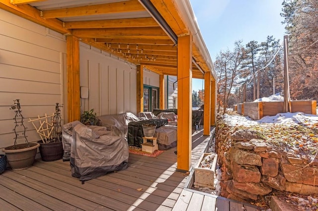 view of snow covered deck