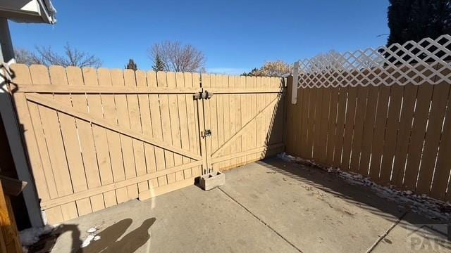 1326 E River St, Pueblo, CO 81001 - view of patio / terrace with fence and a gate